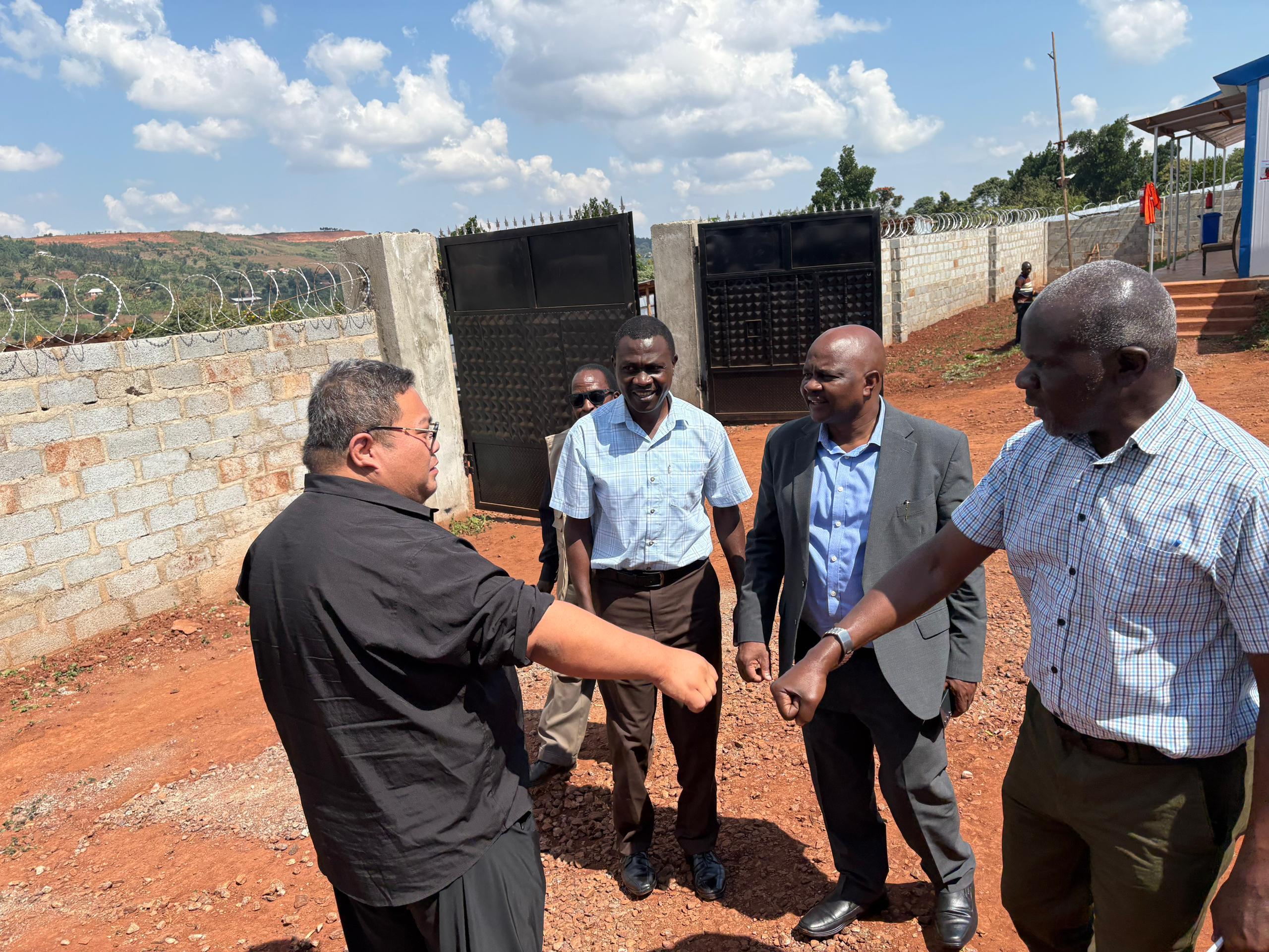 Program Coordinator GKMA-UDP Eng. George Bwanga leads PTC in monitoring progress of Mpigi–Muduuma road works